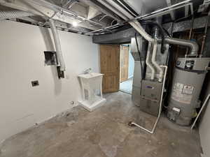 Basement with heating unit and water heater