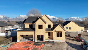Property in mid-construction featuring a mountain view
