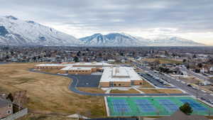 Birds eye view of property featuring a mountain view