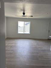 Unfurnished room featuring ceiling fan