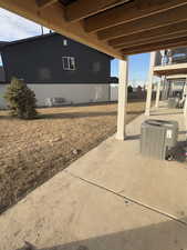 View of patio featuring central AC