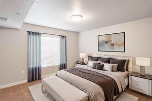 View of carpeted bedroom