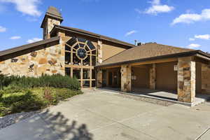 View of front of house with a patio