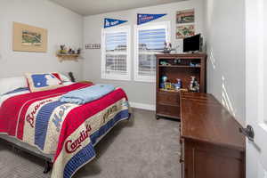 Bedroom featuring carpet flooring