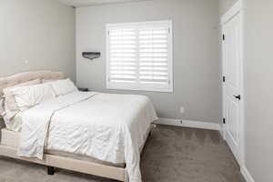 Bedroom with carpet