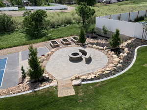 View of yard with a fire pit and a patio