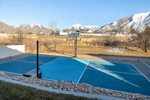 View of basketball court featuring a mountain view