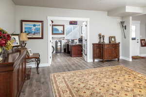 Entrance foyer featuring hardwood / wood-style floors