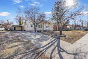 Ranch-style home with a carport