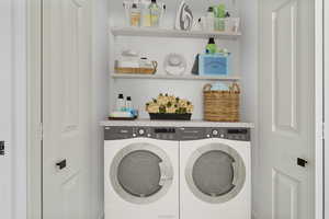 Clothes washing area with laundry area and washer and clothes dryer