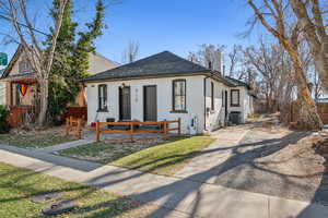 Bungalow-style home featuring cooling unit