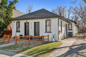 View of front of house with central AC unit