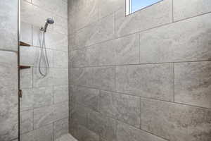 Details featuring a tile shower