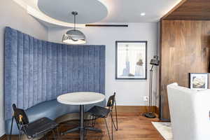 Dining room with hardwood / wood-style floors