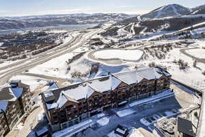 Snowy aerial view with a mountain view