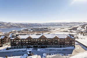 Snowy aerial view with a mountain view