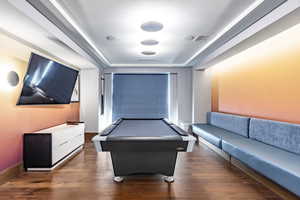 Game room featuring pool table and dark hardwood / wood-style floors