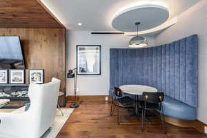 Dining room with wood-type flooring