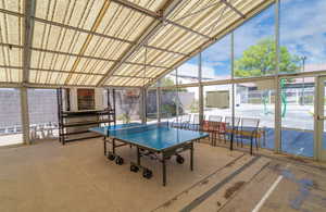 Ping Pong in Covered Pool enlcosure