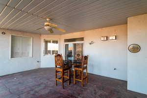 View of patio / terrace with ceiling fan