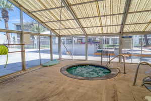 View of pool featuring an indoor in ground hot tub