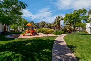 View of playground with a yard