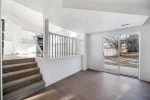 Staircase with wood-type flooring