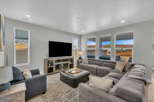 Living room with light wood-type flooring