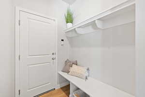 Mudroom featuring hardwood / wood-style flooring