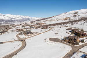 Snowy aerial view with a mountain view