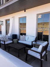 View of patio / terrace with outdoor lounge area and a balcony