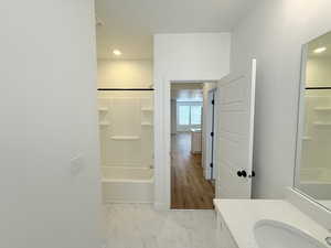 Jack and Jill bath servicing living areas and second floor bedroom