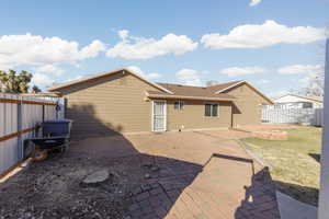 Back of property featuring a patio