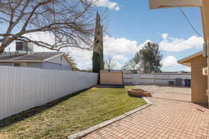 View of yard and a patio area