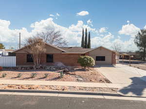 View of front of home with a carport