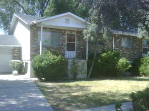 View of front of house featuring a front lawn