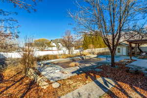 View of yard covered in snow