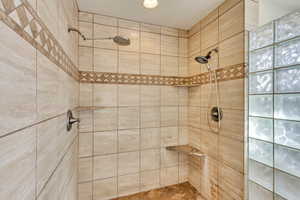 Bathroom with tiled shower