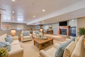 Living room with light hardwood / wood-style floors