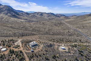 Drone / aerial view featuring a mountain view