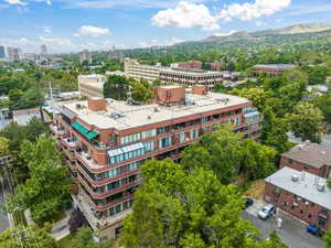 Birds eye view of property with a mountain view