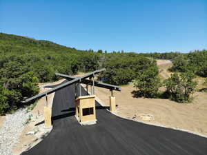 Exterior space with a wooded view