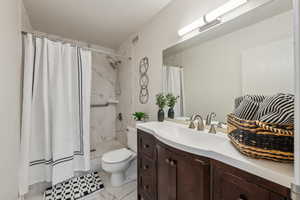 Spacious remodeled Master Bathroom adjacent to Master Bedroom with a spacious linen closet next to the sink.