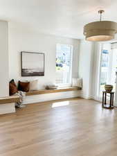 Sitting room with light wood-type flooring