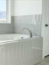 Bathroom featuring tile patterned floors