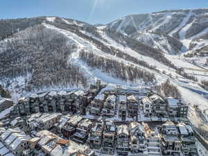 Snowy aerial view with a mountain view