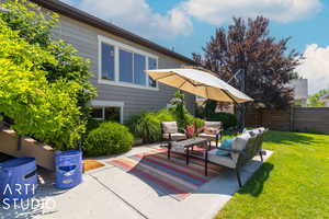 View of patio with an outdoor hangout area