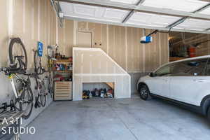 Garage featuring a garage door opener