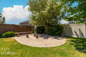 View of yard featuring a fire pit