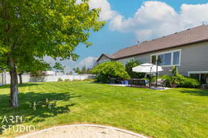 View of yard featuring an outdoor living space and a patio area